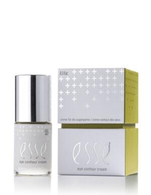 A bottle of Eye Contour Cream with a shiny silver cap sits beside its matching white and green box, both displaying a minimalist modern design accented with silver plus sign patterns.